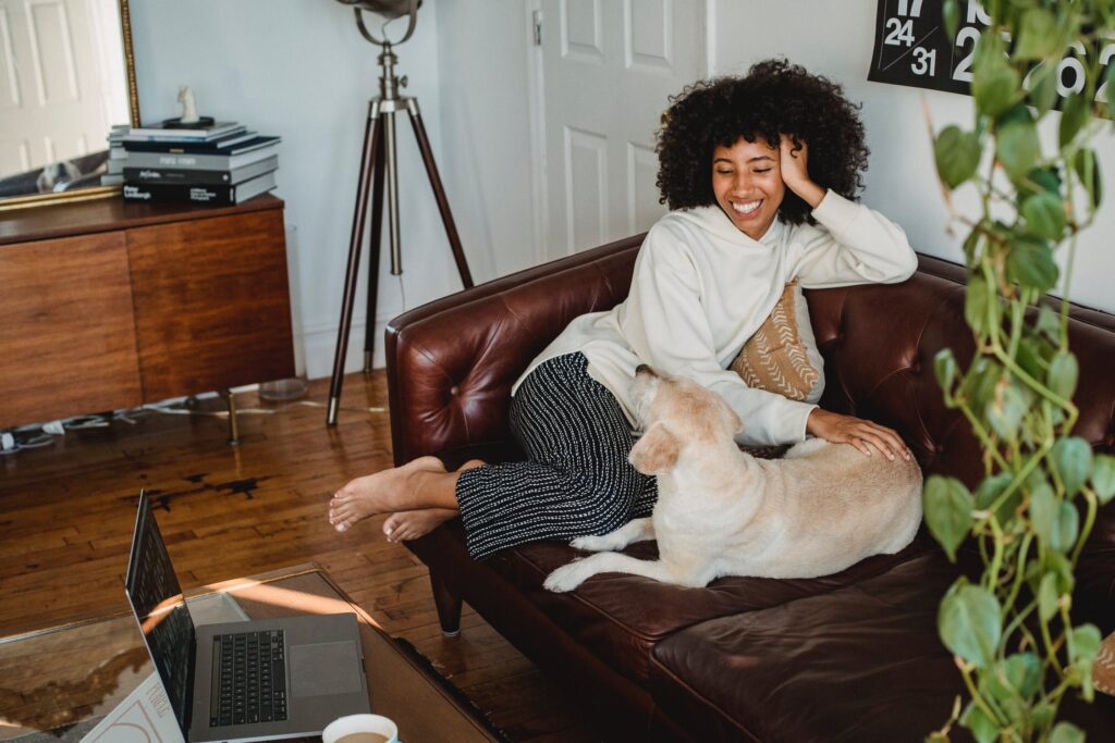 a photo of relaxed woman with a dog