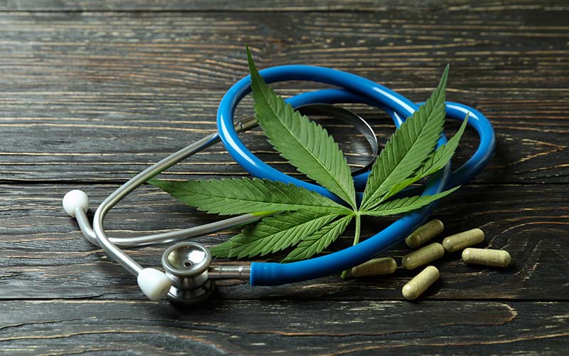 medicinal-cannabis-concept-on-rustic-wooden-opt01